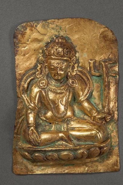 null Le Boddhisattva Lokeshvara assis en dhyanasana sur un socle lotiforme tenant...