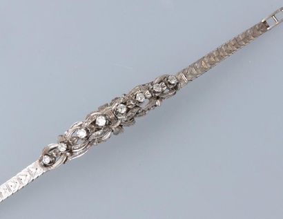 null Bracelet en pressé, argent 925 MM, centré d'un motif ajouré orné de huit diamants...
