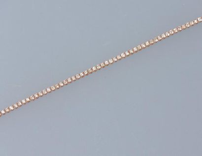 null Bracelet ligne souple en or rose, 750 MM, souligné de beaux diamants taille...