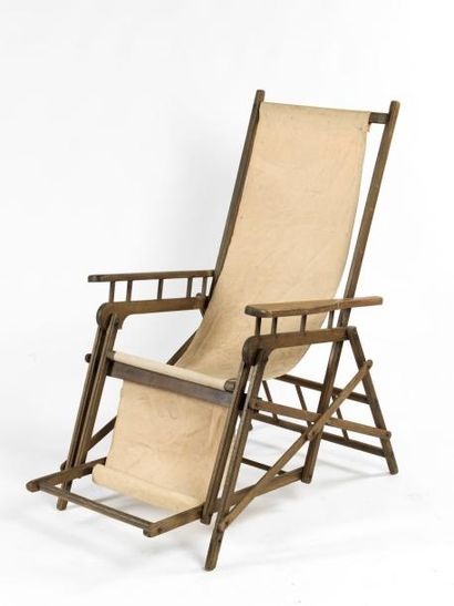 null Une chaise longue en bois et cuir 