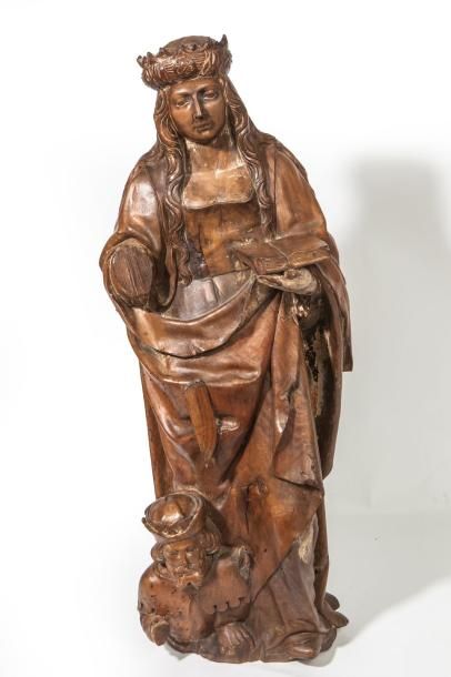 null Sculpture en noyer représentant Sainte Catherine d’Alexandrie. Une des saintes...