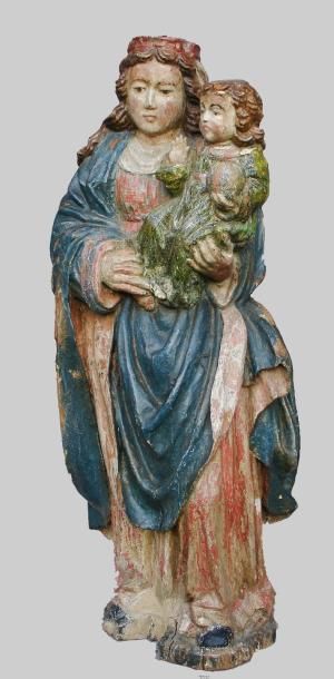 null Sculpture ronde-bosse à dos creux en bois polychrome représentant une Vierge...