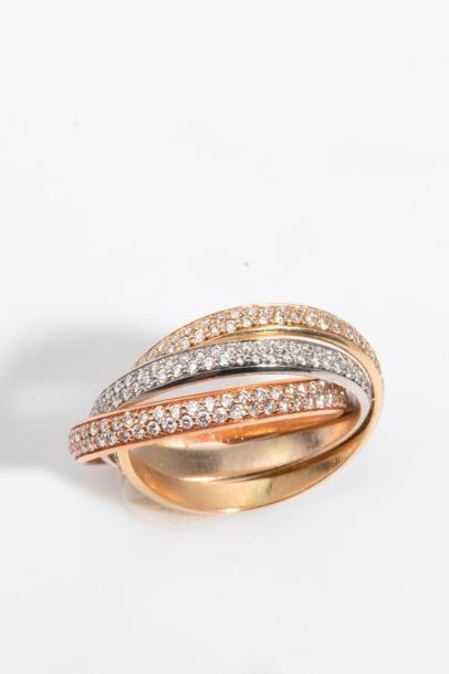 null CARTIER - Bague trois anneaux trois ors jaune rose gris ornés de deux lignes...