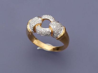 null Bague en or jaune, 750 MM, ornée de deux motifs mordant un anneau, tous recouverts...