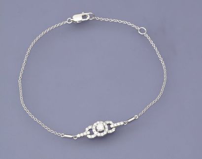 null Fin bracelet d'or gris, 750 MM, centré d'un joli motif diamanté, total : 0,30...