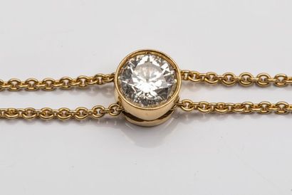 null Bracelet en or jaune surmonté d'un diamant (0,50 carat environ) en serti clos,...