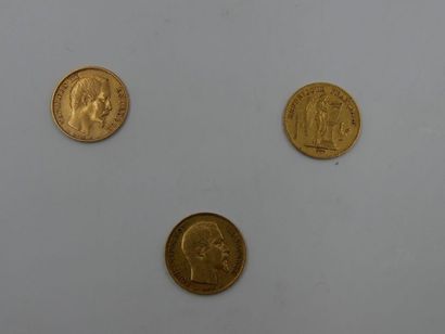 null Trois pièces de 20 francs en or dont : 2 pièces à l'effigie de Napoléon III...