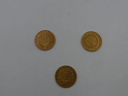 null Trois pièces de 20 francs en or dont : 2 pièces à l'effigie de Napoléon III...