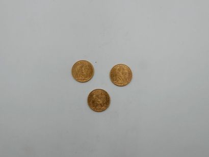 null Trois pièces de 20 francs coq en or datées 1905, 1909, 1911. Poids : 19,3 g...