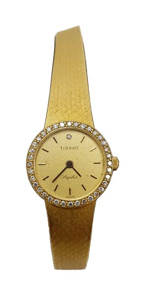 Tissot 
Montre et bracelet de femme en or, cadran entouré de petits brillants c.1970,...