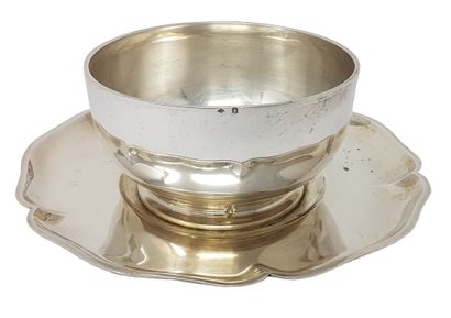 PUIFORCAT 
Silver sauceboat with its adherent display stand, signed with Minerve...