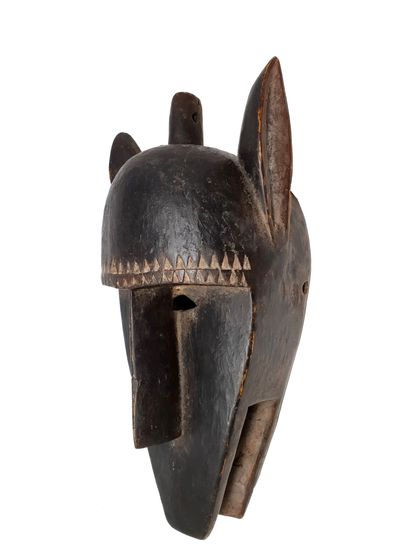 Masque zoomorphe du koré 
Masque en bois dur à patine brune H : 41 cm. Mali Bambara...