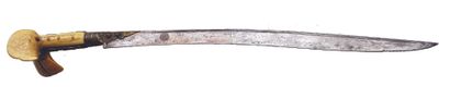 YATAGAN OTTOMAN With ivory and silver ear grip, inscription on the curved steel blade,...