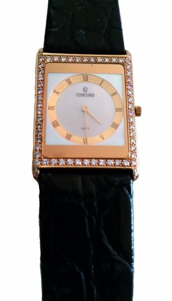 CONCORD EXTRA-PLATE DE 1990 Montre bracelet de femme extra-plate, or jaune 26,5 gr....