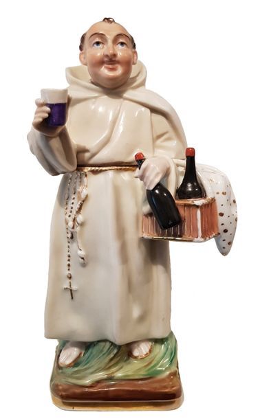 PARIS - Porcelaine Tisanière à décor polychrome représentant un moine tenant un verre,...