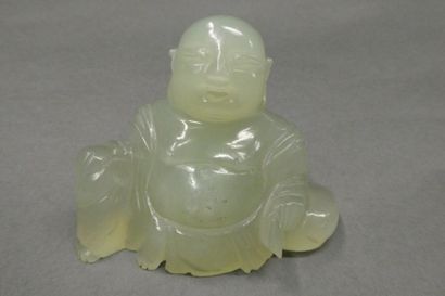 ASIE Petit sujet en jade figurant un buddha assis.
H.: 2,5 cm
(lot non reproduit...