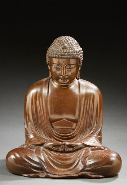 JAPON 
Bouddha en bronze assis en position de lotus.
XXe siècle, Vers 1930/1950.
Dim.:...