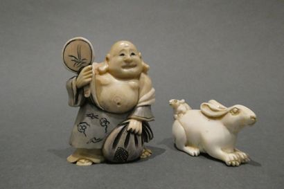 null JAPON


Deux netsuke représentant un lapin assis et un bouddha debout