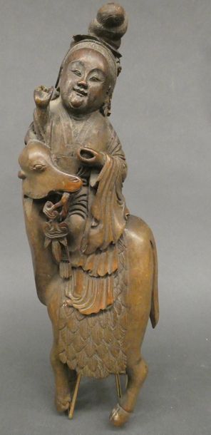 null CHINE


Sujet en bois sculpté figurant une divinité chevauchant un animal.


Ht:...