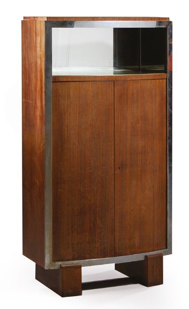 JACQUES ADNET (1900-1984) 
Display cabinet with slightly curved box in rosewood veneer...