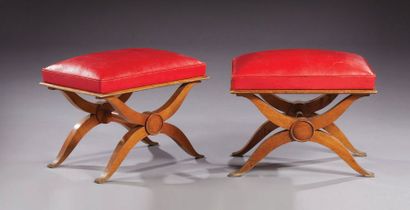 TRAVAIL FRANÇAIS Pair of stools in stained beech wood, "X" base, red leatherette...