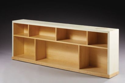 TRAVAIL MODERNE Oak bookcase partially covered with parchment H: 70 L: 199 D: 29...