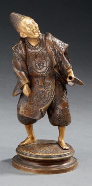 JAPON - Epoque MEIJI (1868-1912) Okimono en bronze partiellement doré, danseur debout...