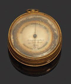 null Pocket barometer in gilded metal, the dial marked
Bourgeuil Opticien à Paris.
On...