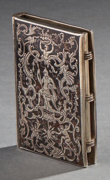 null Silver and tortoiseshell notebook decorated with antique characters and scrolls.
18th...