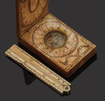 null Set comprising a compass made of wood and boiled cardboard, and a king's foot.
(Missing...