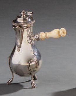 null Selfish little tripod sterling silver coffee pot.
Paris late 18th century.
Height:...