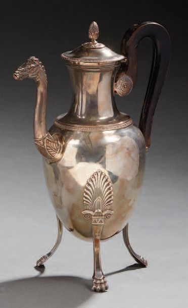 null Silver tripod drinking jug, claw feet with leafy attachments, zoomorphic spout...