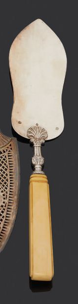 null Silver pie server, the attachment in the shape of a shell.
Paris 1819-1838.
Length:...