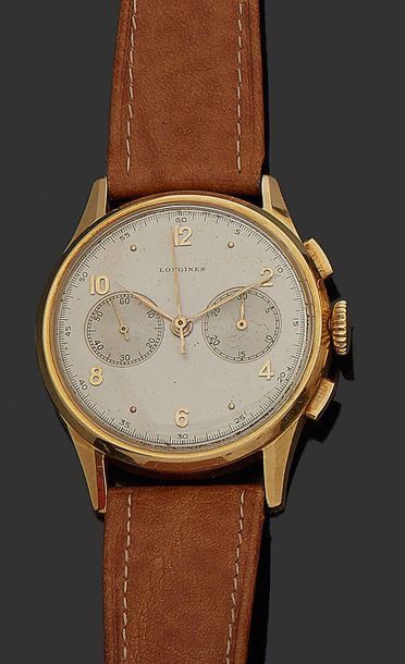 LONGINES 
Montre bracelet chronographe d'homme en or jaune 18K (750), boitier rond,...