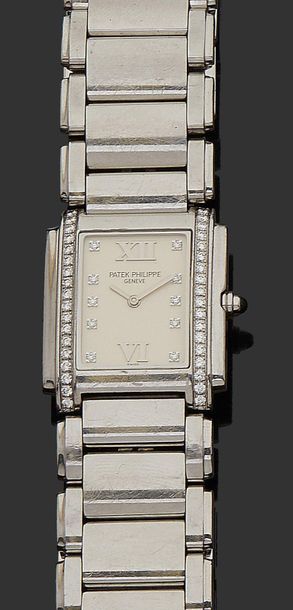 PATEK PHILIPPE TWENTY-4 
Ladies' bracelet watch in steel, rectangular case set with...