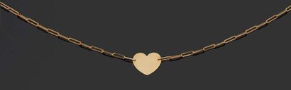 DINH VAN 
Collier pendentif coeur en or jaune 18K (750) à maillles forçat.
Poids...