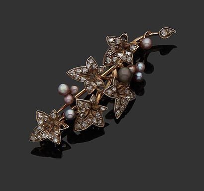 null 18K (750) et argent yellow gold brooch in the shape of a branch set with brilliants...