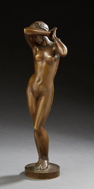 FALGUIÈRE, d'après 
Chiseled bronze statuette with a golden patina representing a...