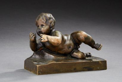 null SUJET en bronze à patine médaille figurant un enfant. 
Travail fin du XIXe siècle....