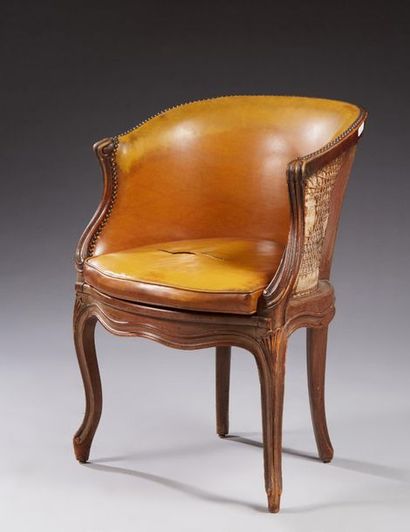 null CANNED OFFICE FAUTEUIL and leather trim.
Louis XV style