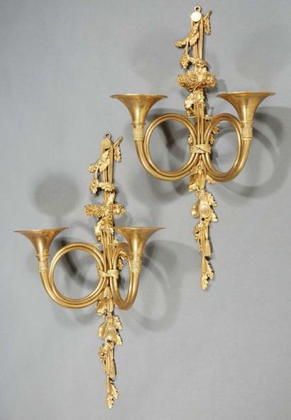 null PAIR OF TWO-LIGHT HORN SPLACES known as "hunting horns" in chased and gilded...