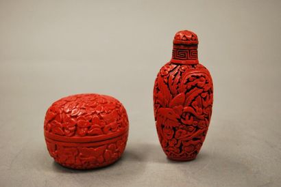 null CHINA 



A snuffbox bottle and a circular covered box in cinnabar-red lacquer...