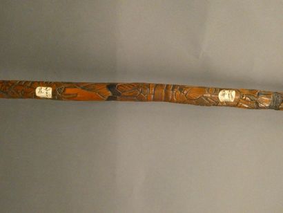 null JAPAN



Wooden cane carved with landscapes and men's heads made of bone. 



Meiji...