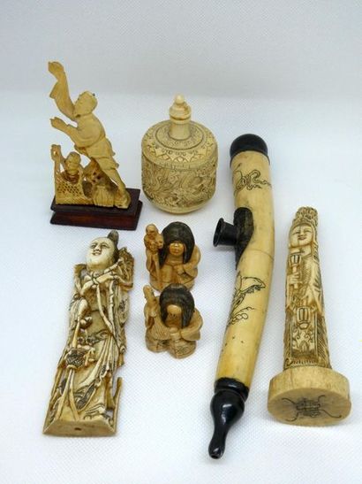 null Set of various bone objects including opium pipe, carved subjects, covered box...



Gross...