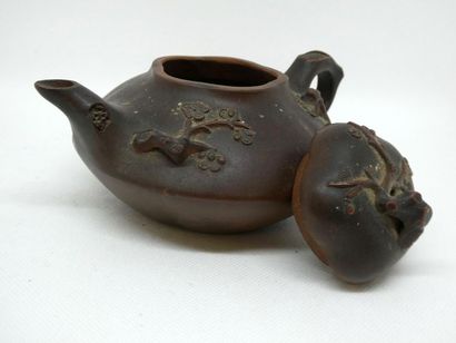 null CHINA



Terracotta teapot decorated with branches in relief. Stamp in hollow...
