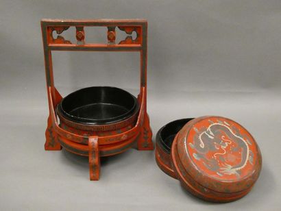 null CHINA



Double compartment box in red lacquered wood with black dragon decoration....