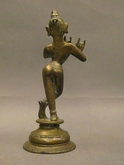 null Bronze divinity. 



Indian work. 



H. : 25,5cm