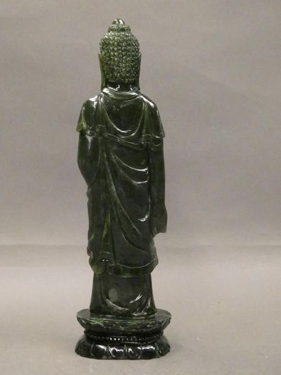 null CHINE



Grande statuette de Guan Yin en jade épinard.



H. : 34 cm