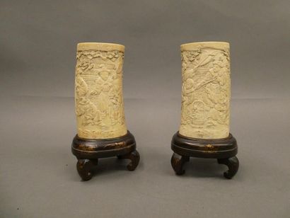 CHINA 
 
Set of two ivory brush holders carved...