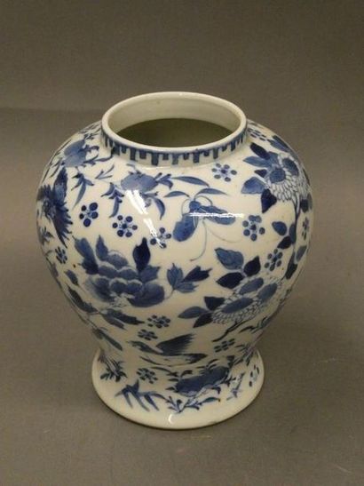 null CHINA



Porcelain vase with blue-white decoration of foliage and birds



Four-character...